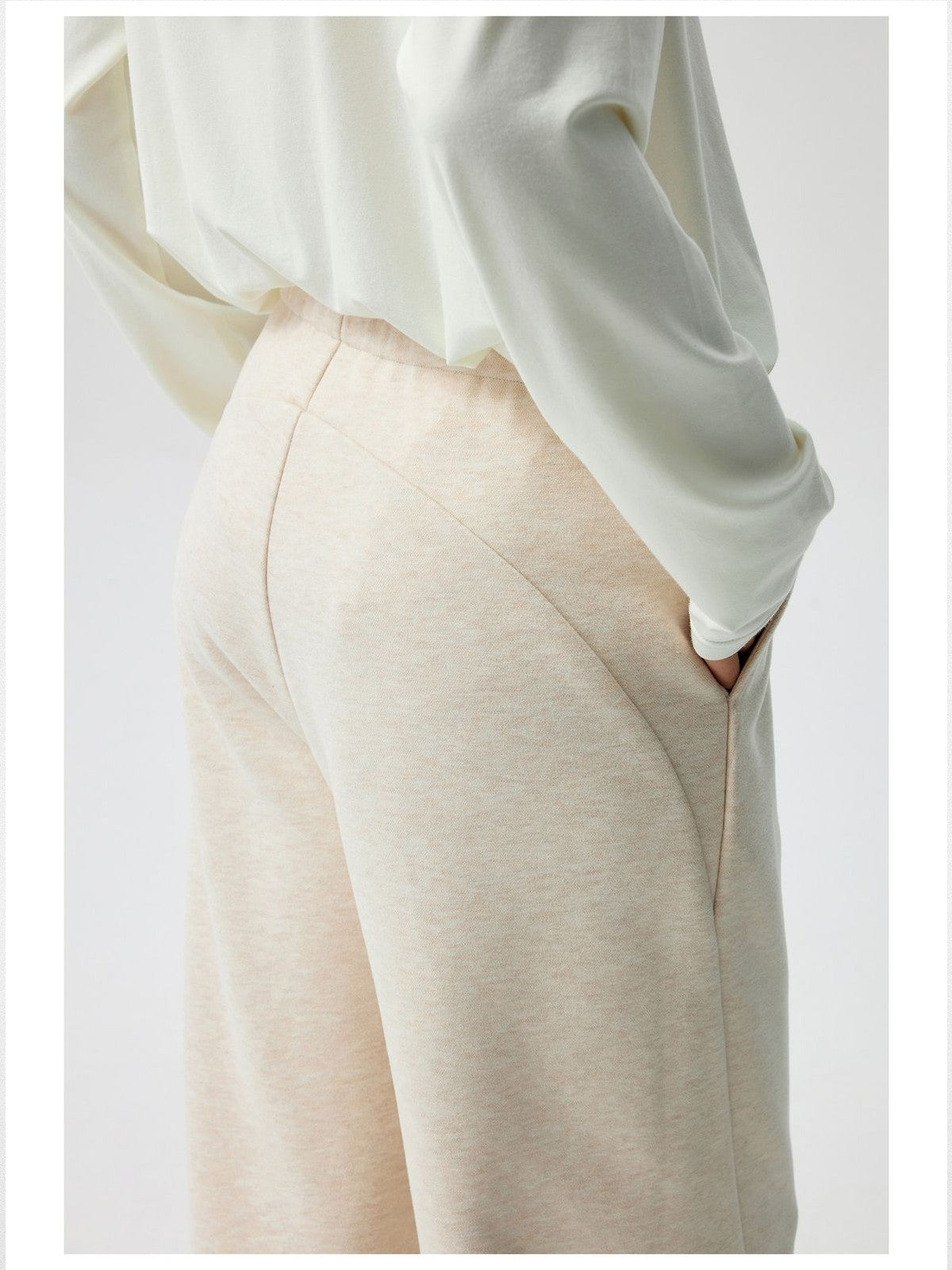 Simple Project Curved Seam Drawstring Sweatpants in Beige - On Model
