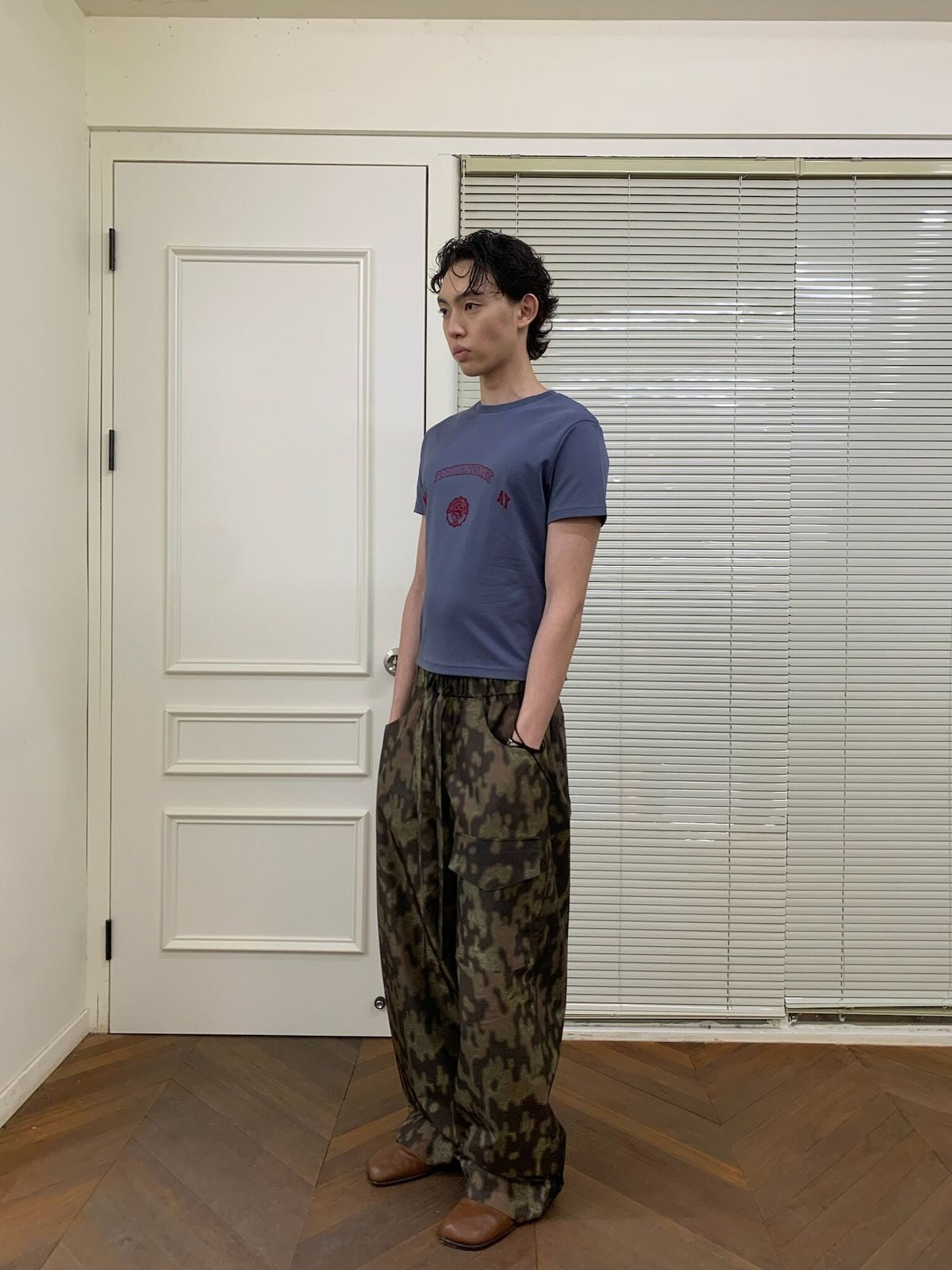 NeverSeez Quick Dry Wide Leg Trousers in Camouflage - On Male Model