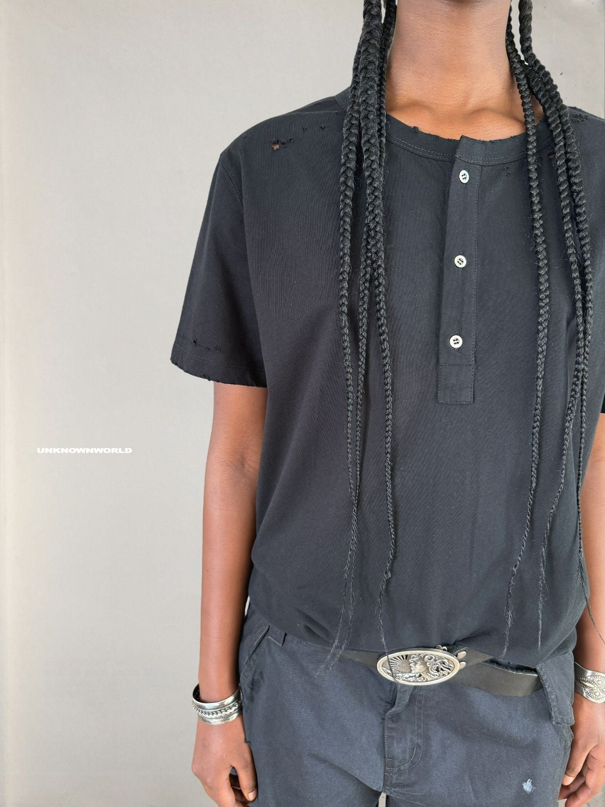 UNKNOWNWORLD Distressed Cotton Henley T Shirt in Black - On Model
