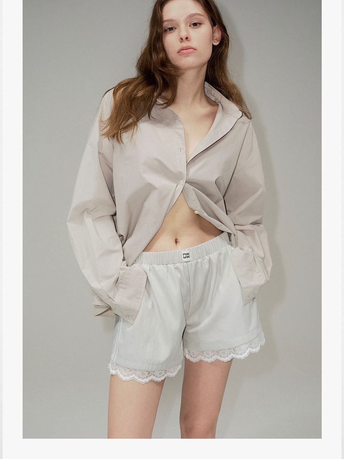 PUKI Lace Hem Track Shorts in Gray - On Model