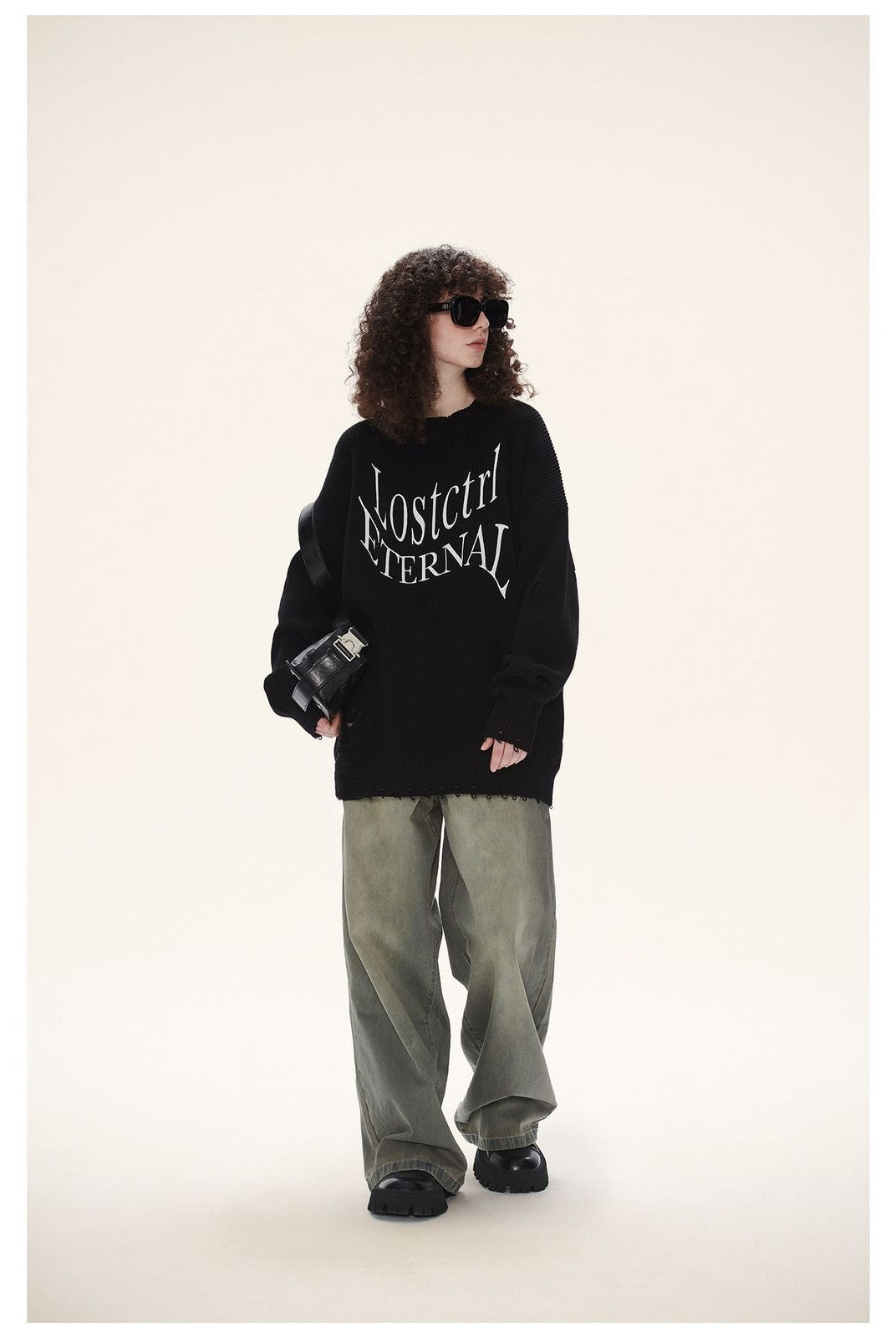 LOSTCTRL Distressed Logo Cotton Sweater in Black - On Model