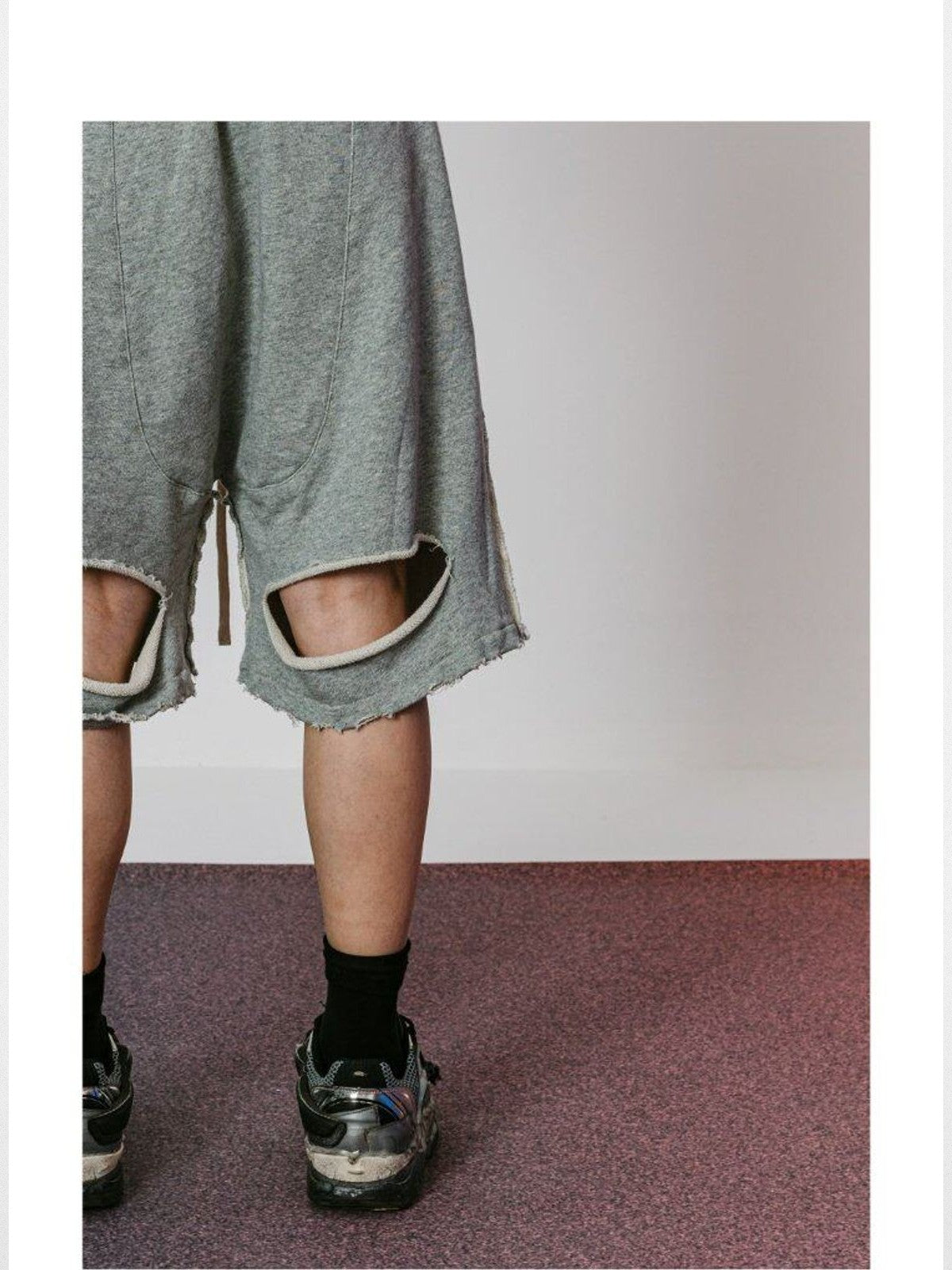 LOSTCTRL Raw Edge Panel Sweat Shorts in Gray - On Male Model