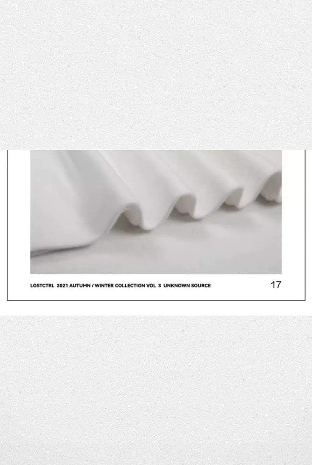 LOSTCTRL Embroidered Mock Neck Top in White - Detail