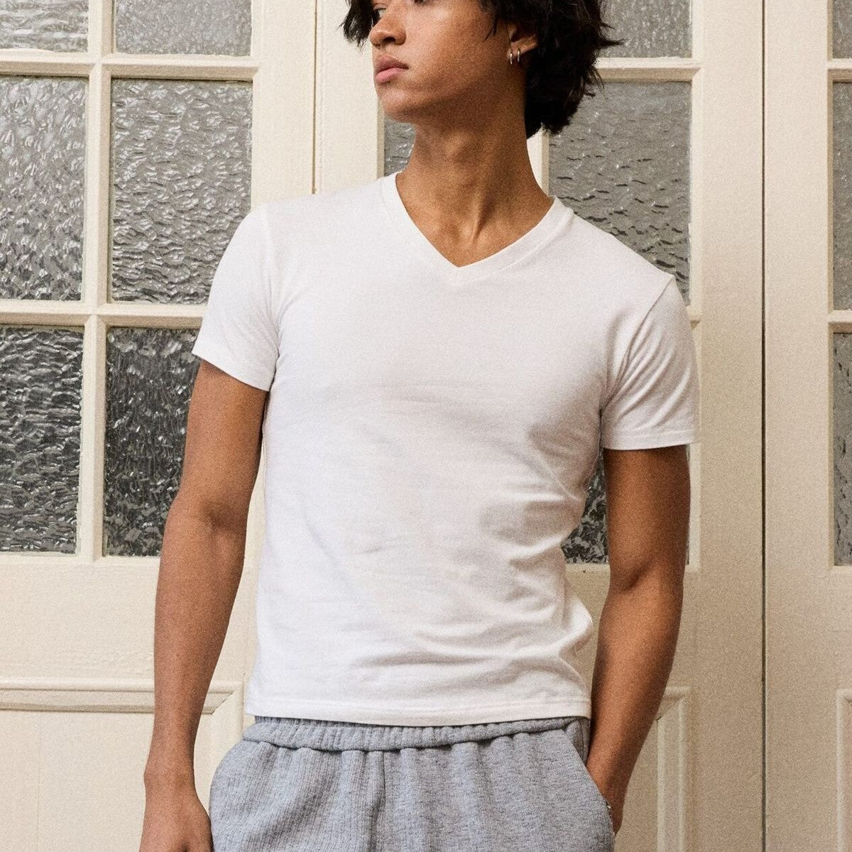 Retro 21 Anti Wrinkle V Neck T Shirt in White - On Model