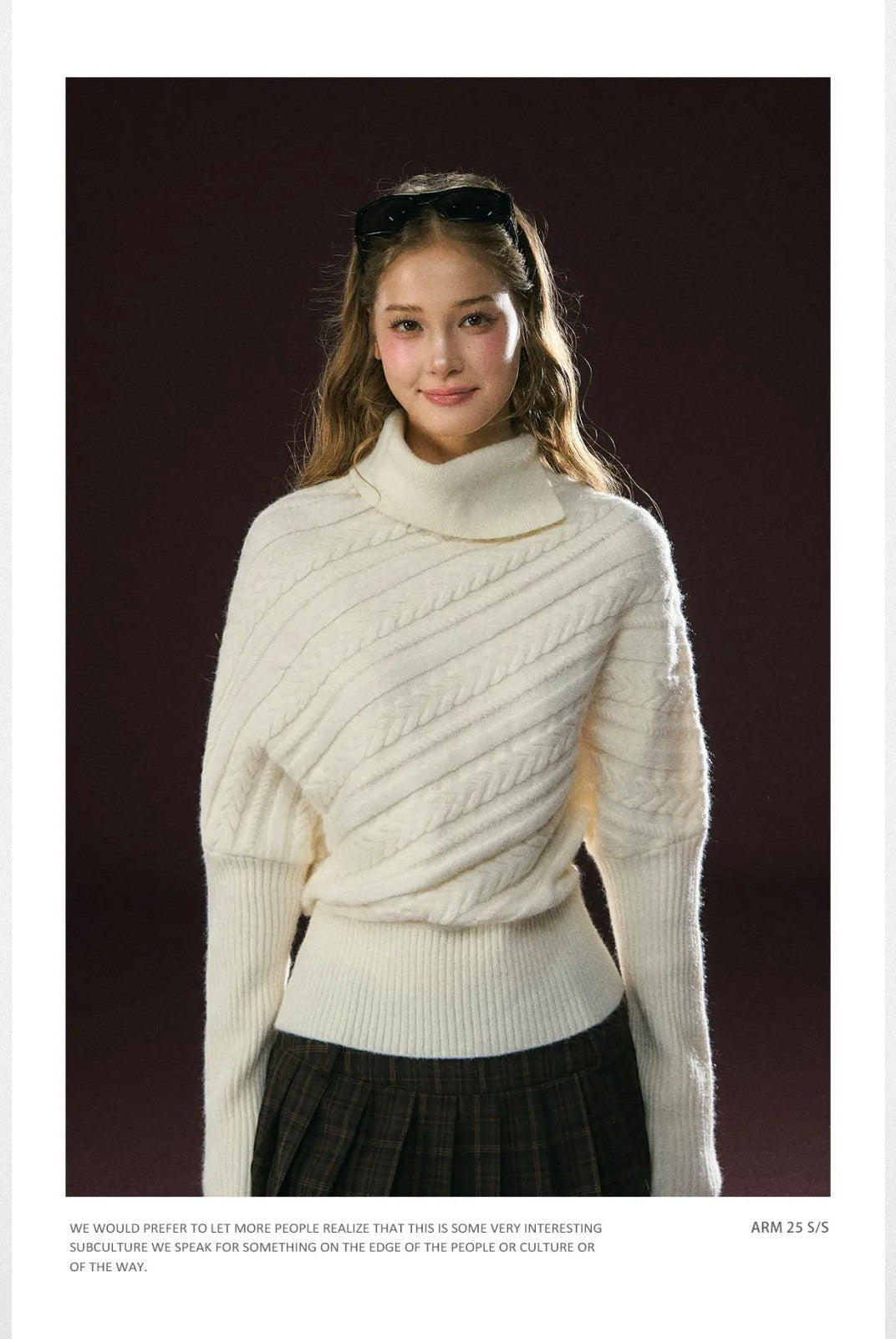 Ariseism Diagonal Cable High Neck Sweater in White - On Model