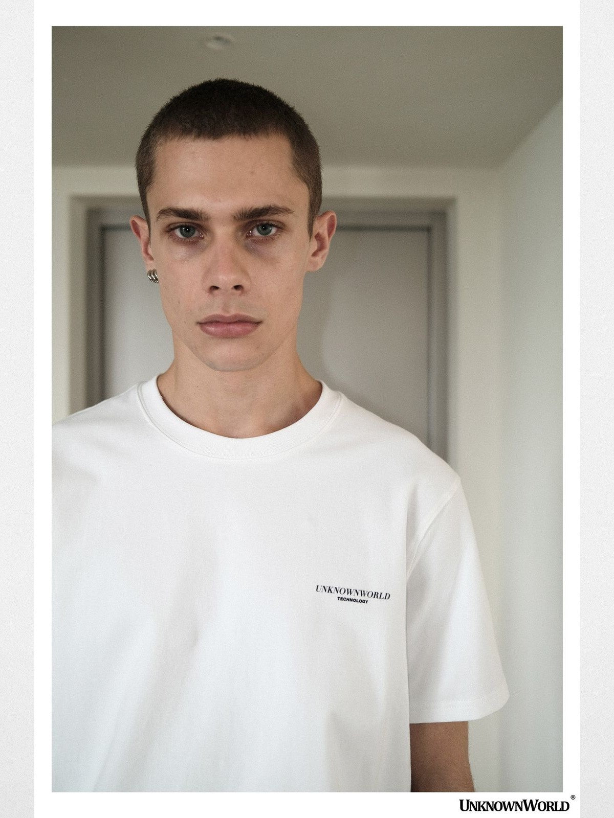 UNKNOWNWORLD Small Logo Cotton T Shirt in White - On Model