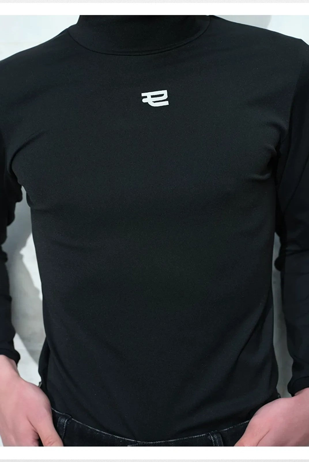 TRIANGLE PROJECT Logo High Neck Long Sleeve Top in Black - On Model