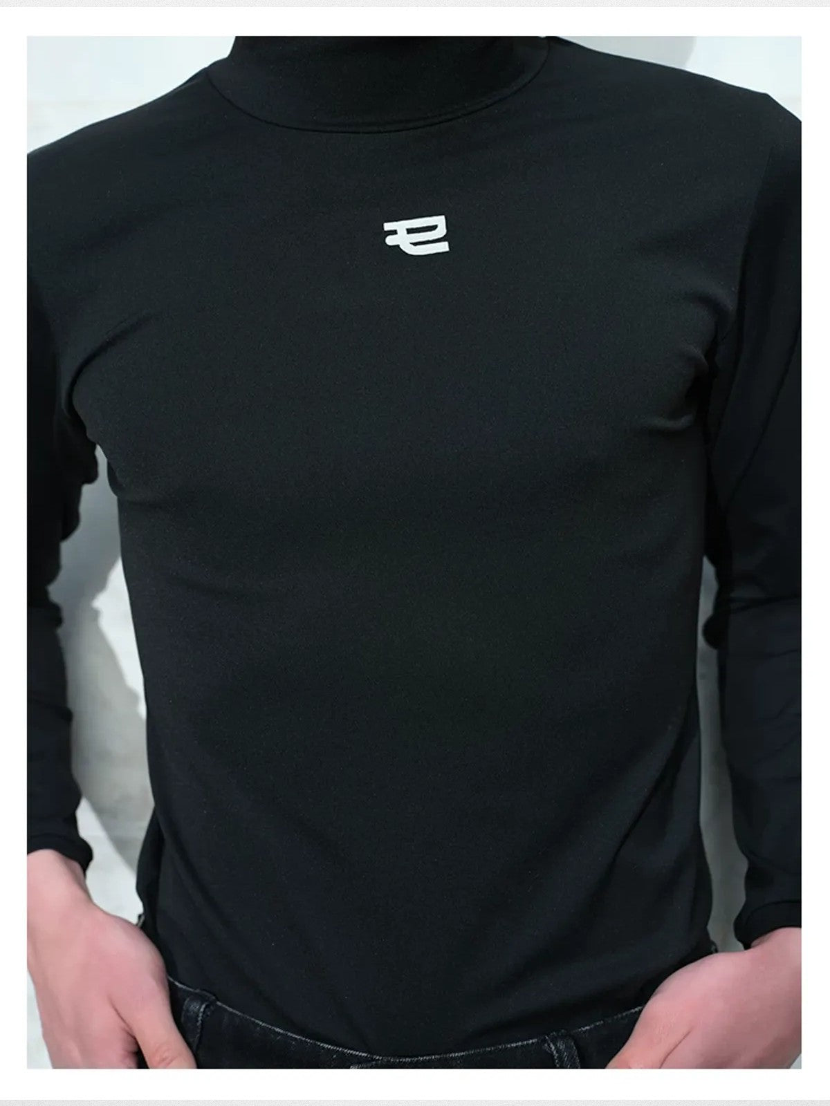 TRIANGLE PROJECT Logo High Neck Long Sleeve Top in Black - On Model