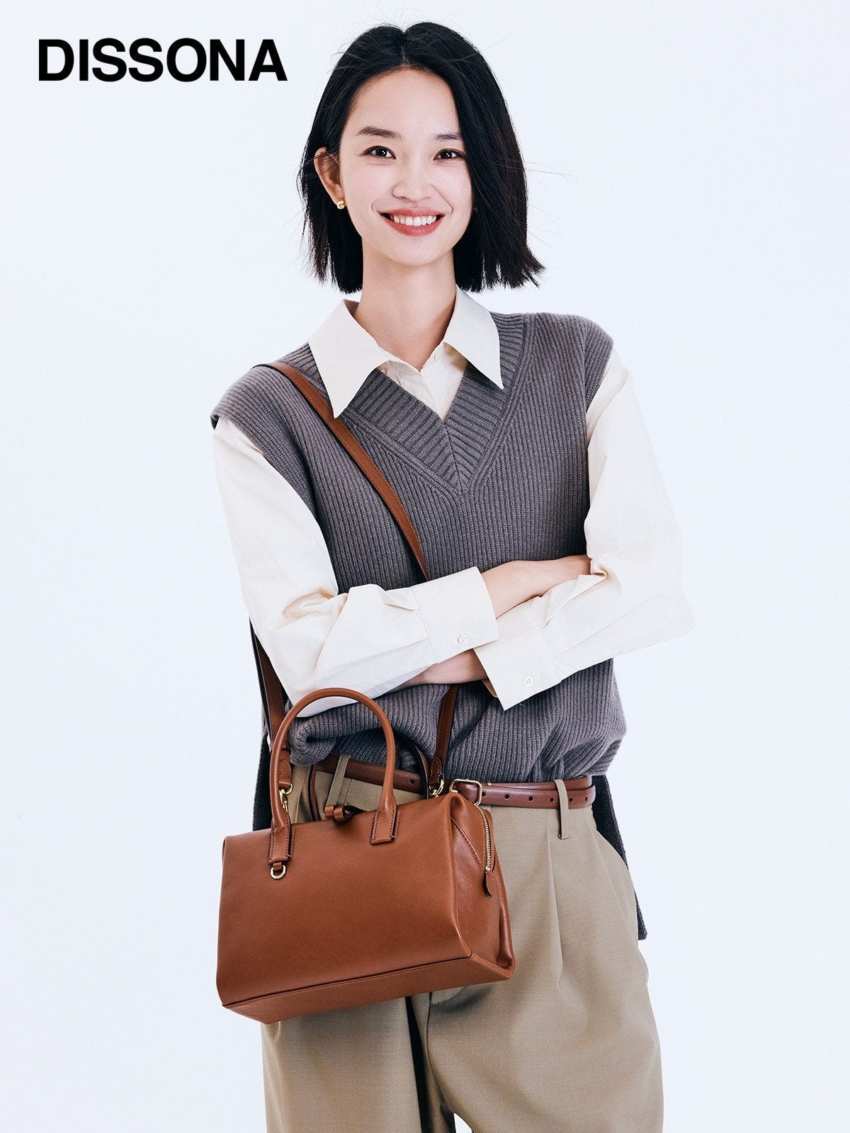 DISSONA Leather Top Handle Boston Bag in Brown - On Female Model