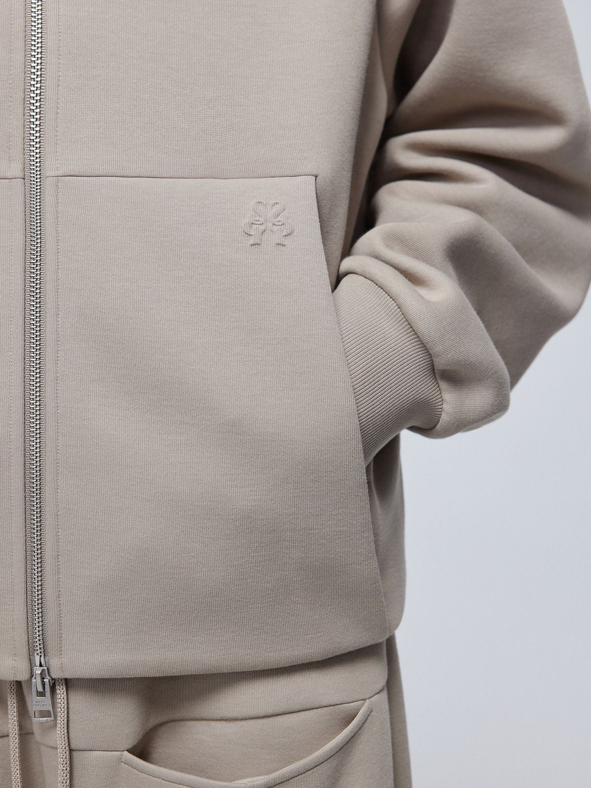 Simple Project Logo Embossed Zip Hoodie in Beige - Detail