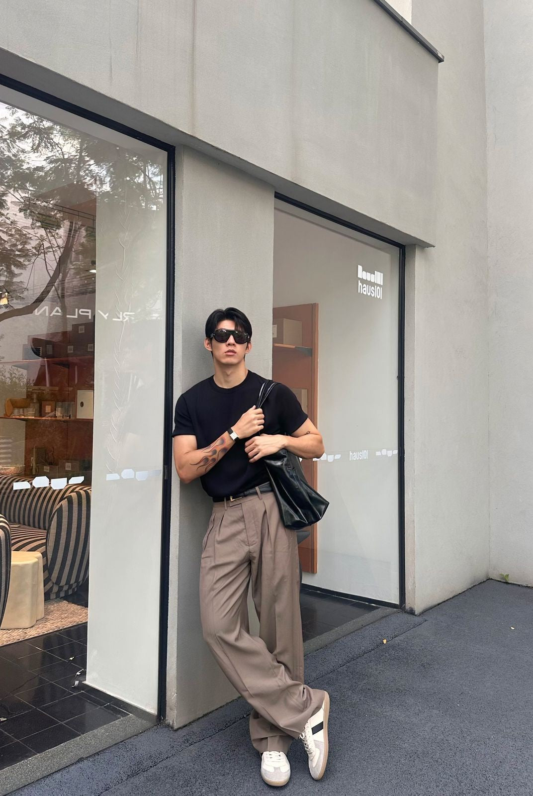 Roolrren Homme Pleated Wool Trousers in Beige - On Model