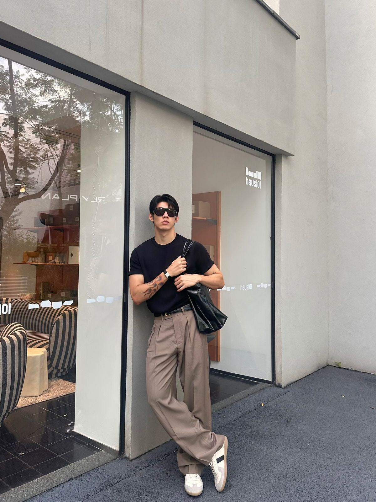 Roolrren Homme Pleated Wool Trousers in Beige - On Model