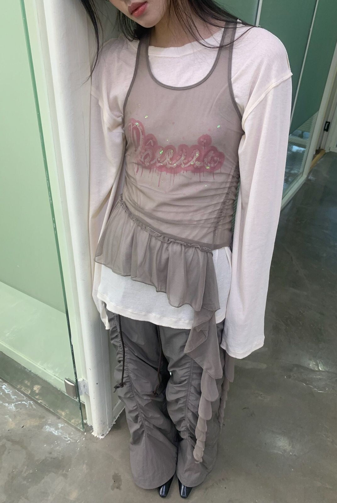 NeverSeez Asymmetric Mesh Streamer Tank in Gray - On Model