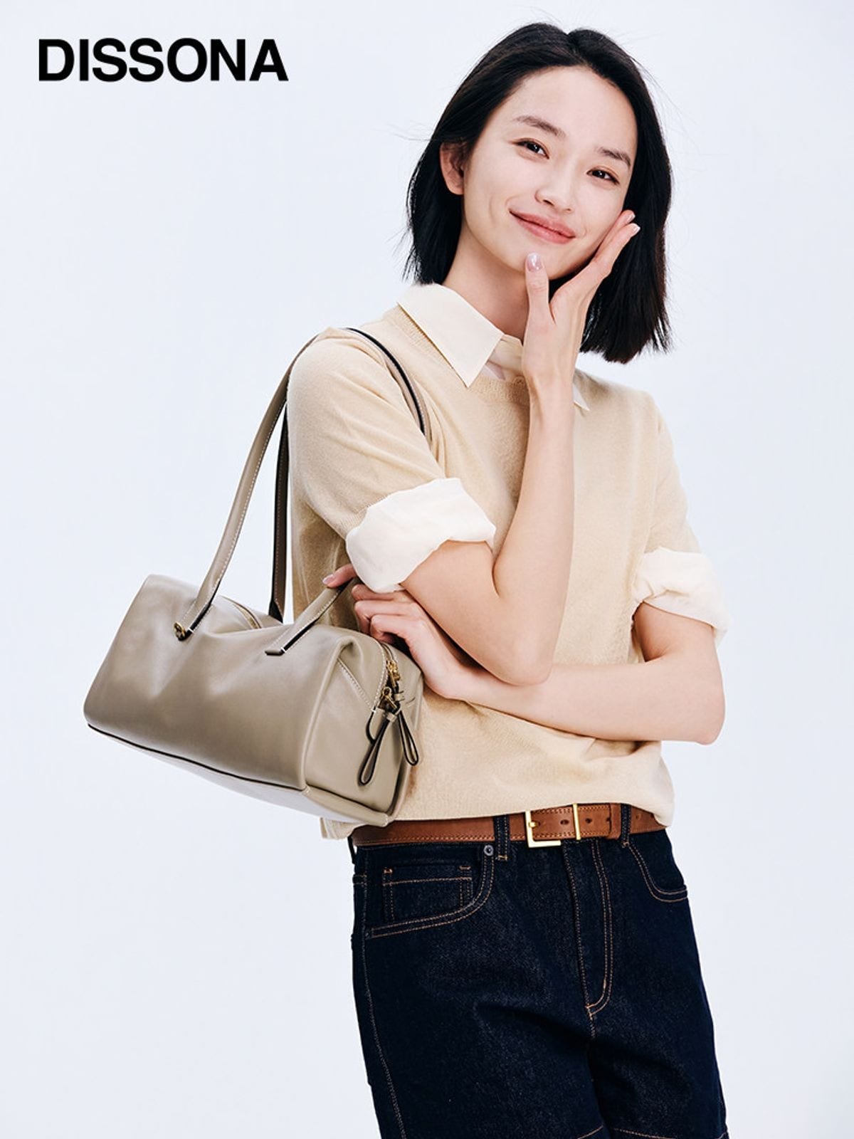 DISSONA Vegetable Tanned Leather Baguette Bag in Beige - On Female Model