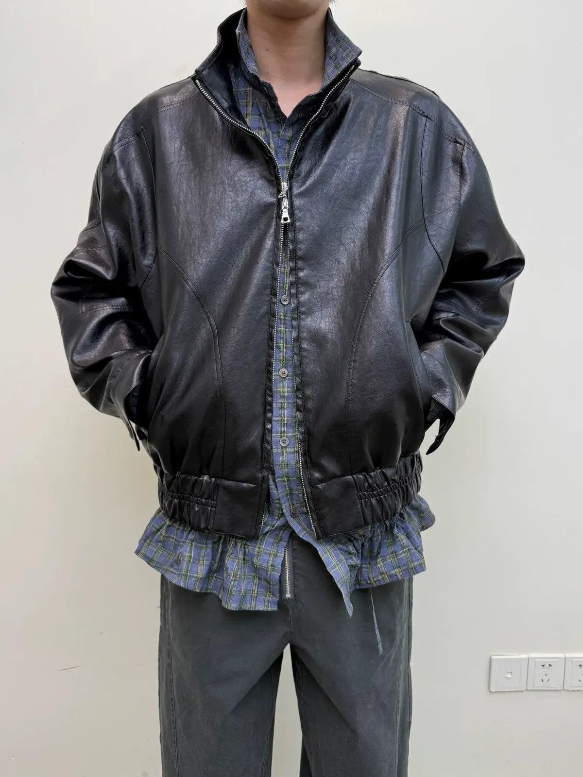 NeverSeez Stand Collar Faux Leather Jacket in Black - On Male Model