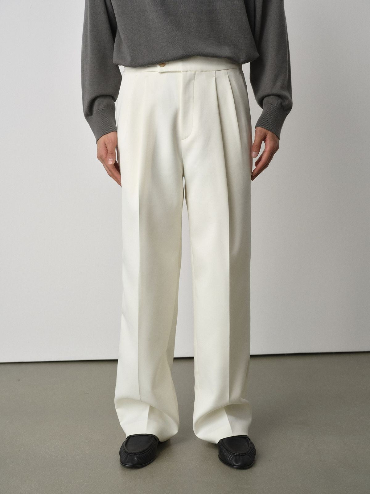 ROYA Pleated Acetate Wool Trousers in White - On Model