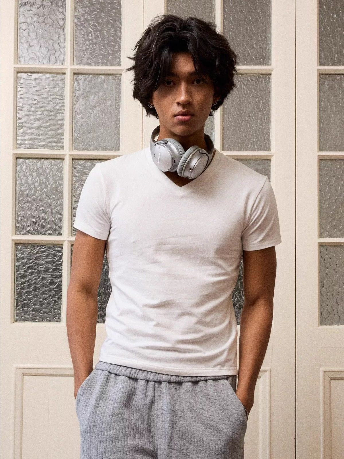 Retro 21 Anti Wrinkle V Neck T Shirt in White - On Model