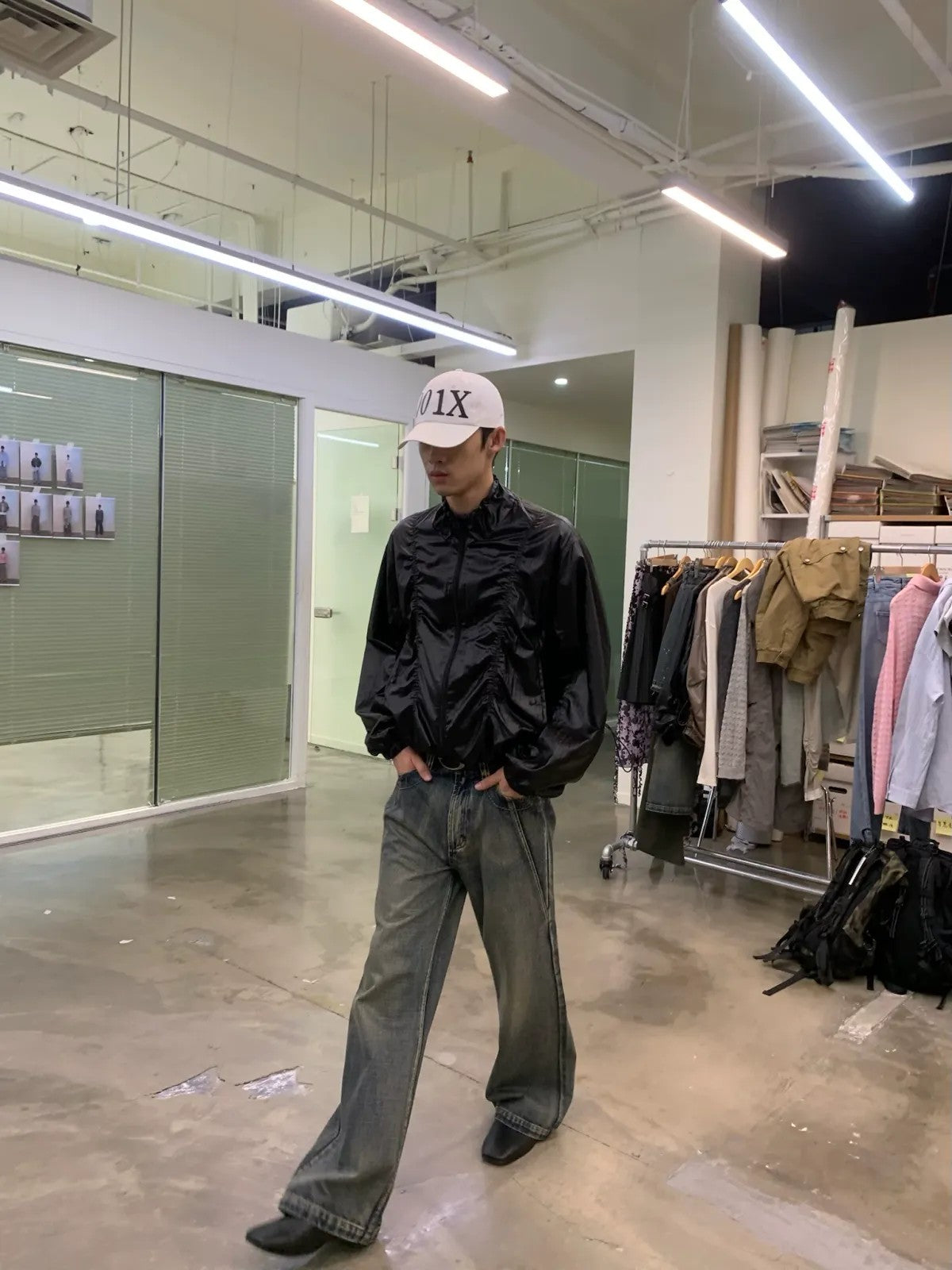 NeverSeez Glossy Ruched Tencel Windbreaker in Black - On Male Model