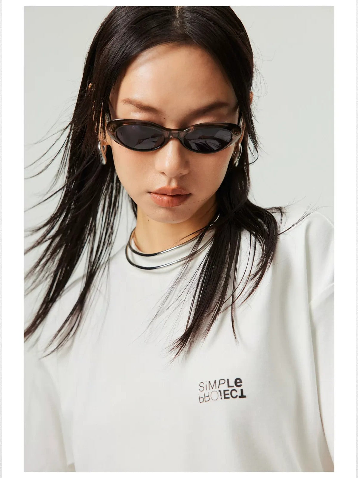 Simple Project Inverted Logo High Crew Tee in White - On Female Model