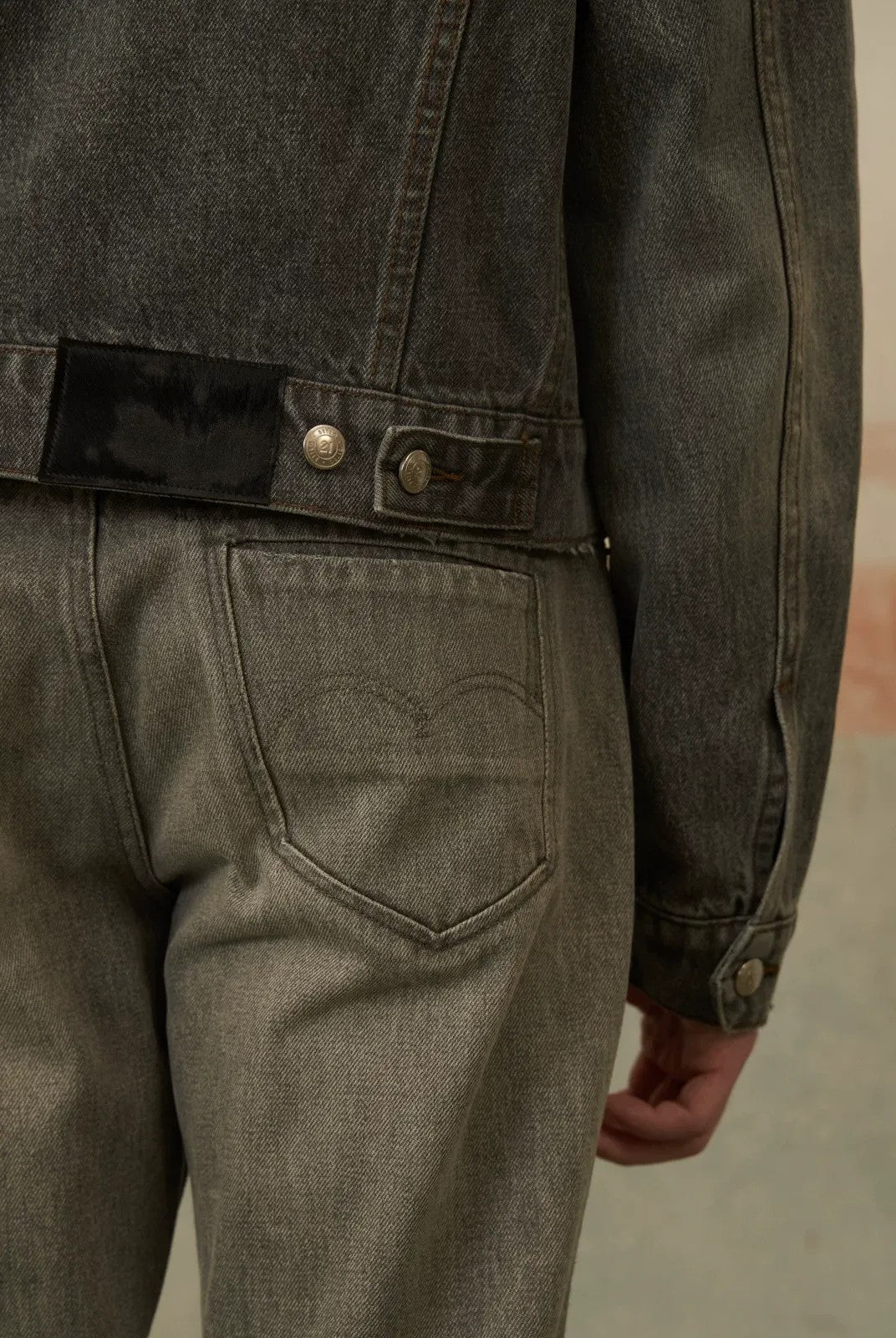 Retro 21 Distressed Gray Denim Jacket with Shoulder Pads in Gray - On Model