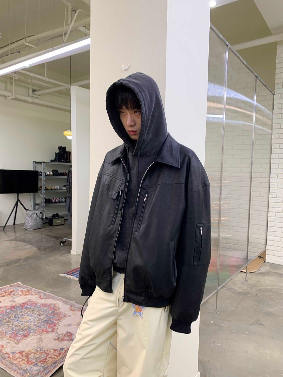 NeverSeez Leather Down Puffer Jacket in Black - On Male Model