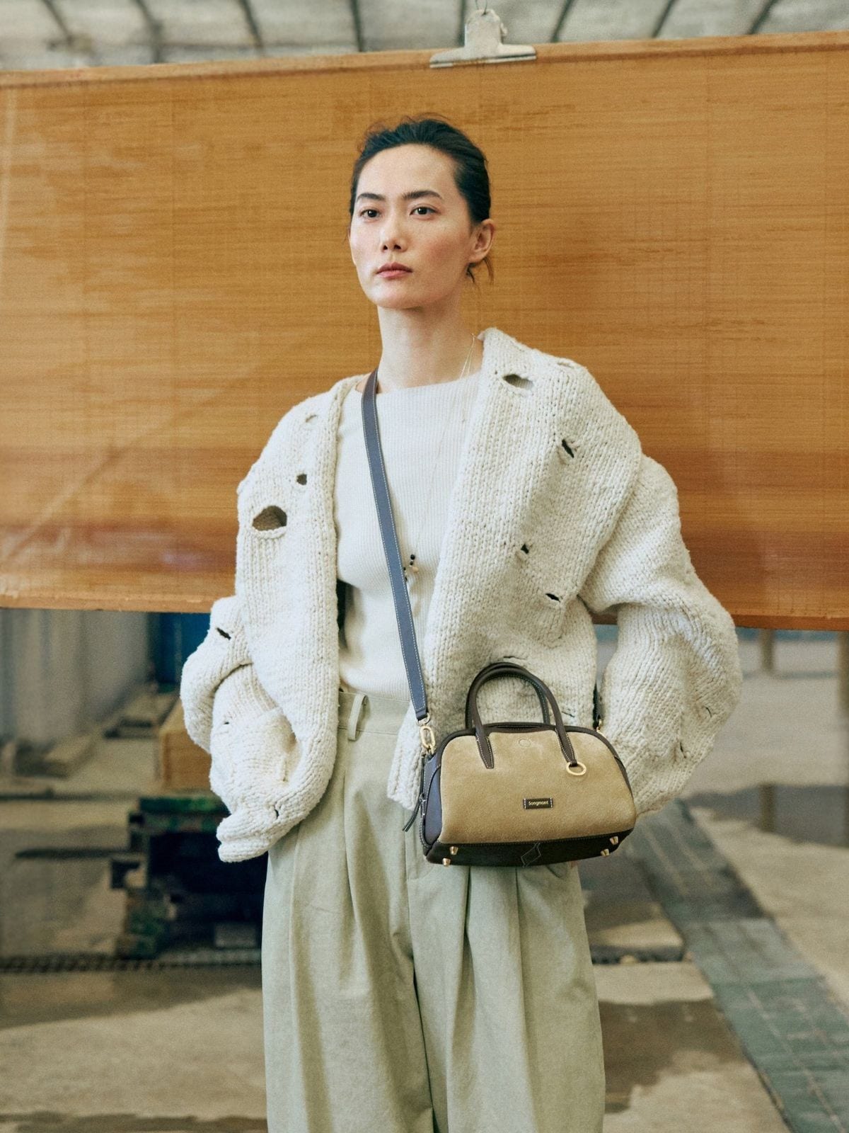 Songmont Leather Mini Bowling Bag in Beige - On Model