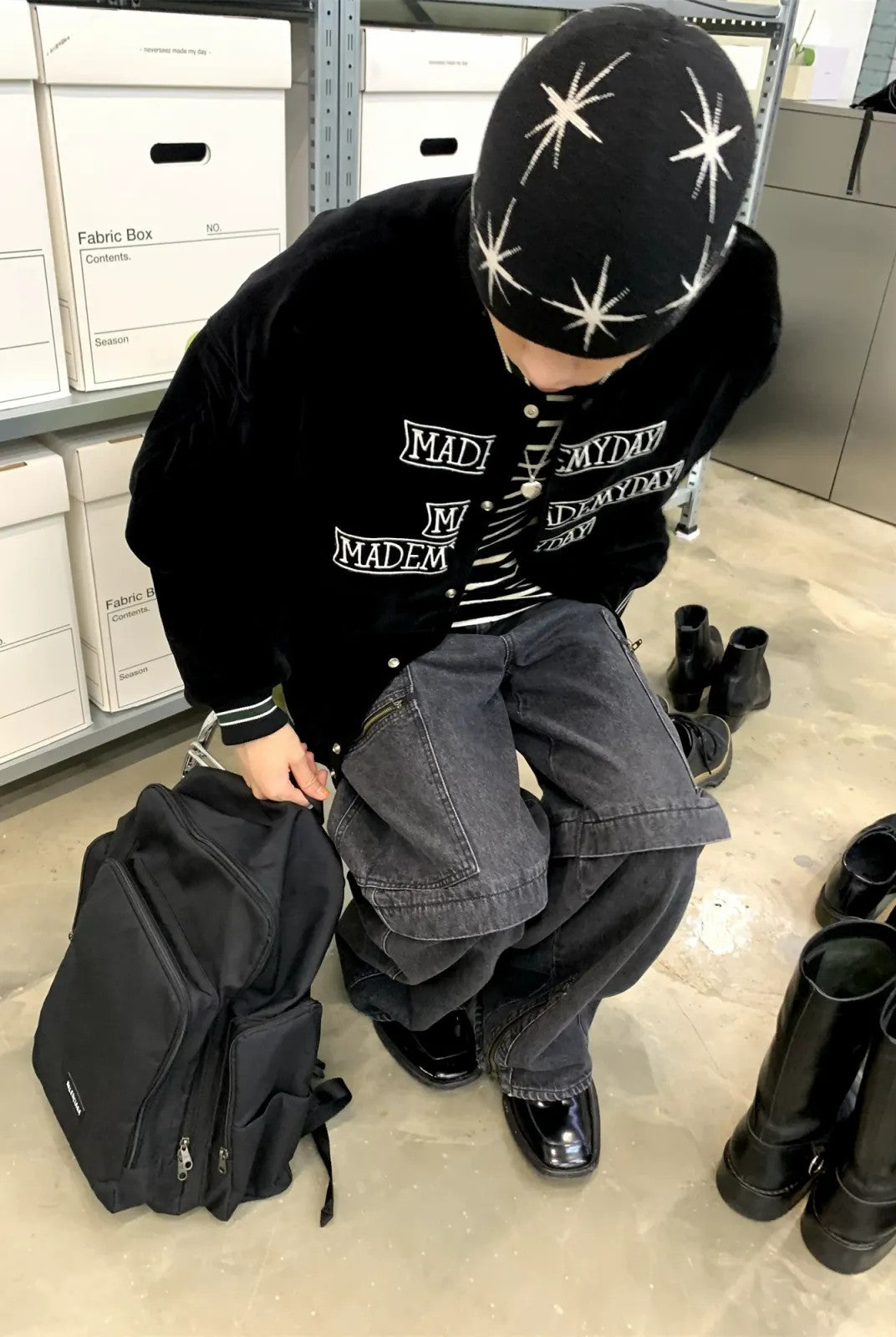 NeverSeez Velvet Corduroy Padded Varsity Jacket in Black - On Model