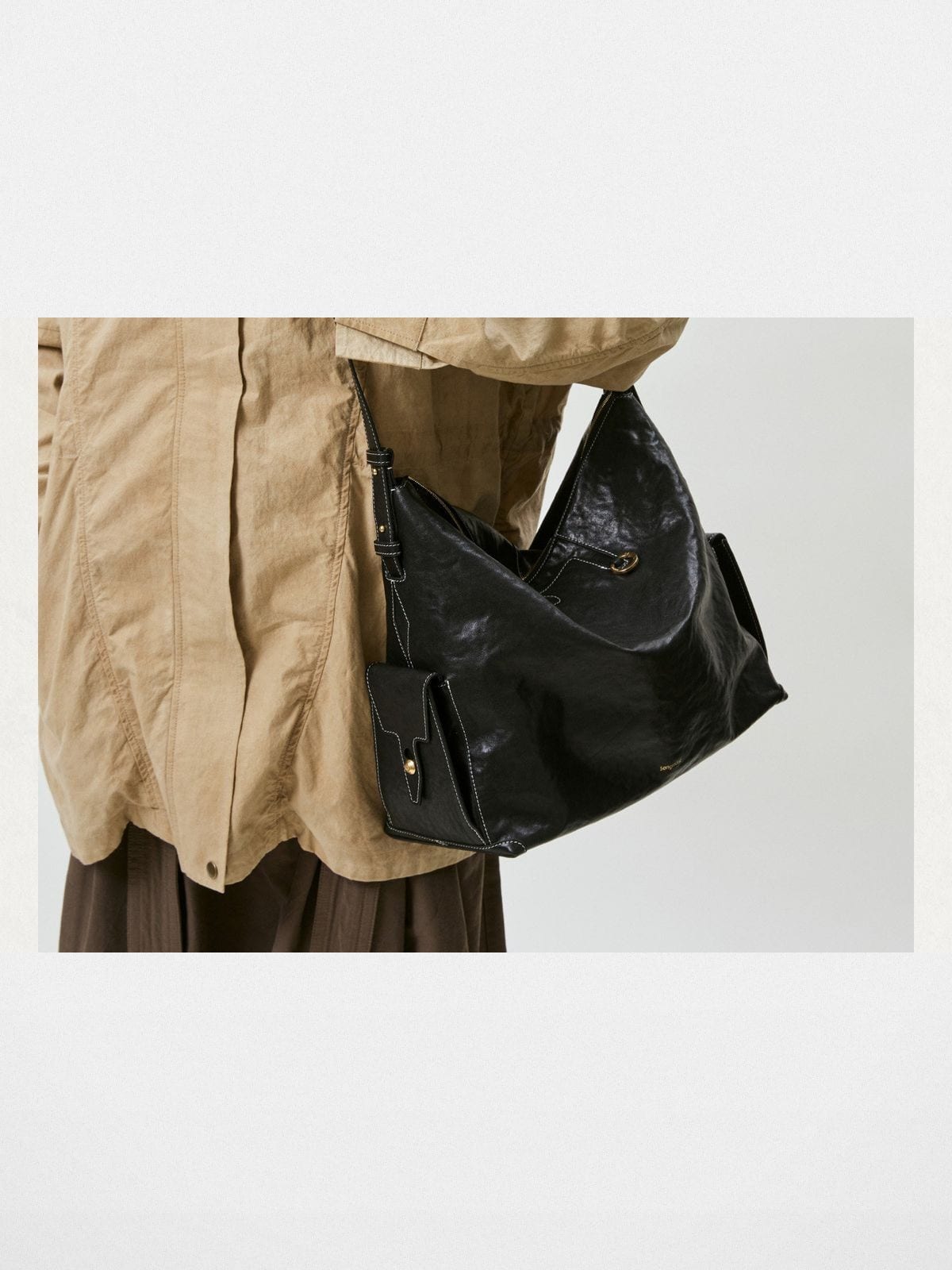 Songmont Large Suede Laptop Hobo in Black - On Female Model