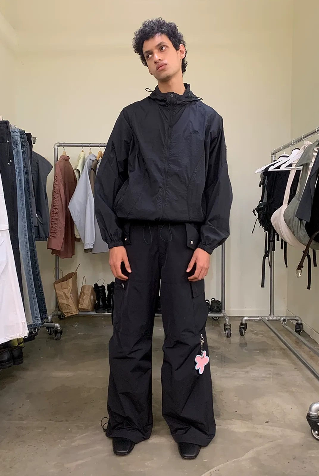 NeverSeez Accordion Pocket Wide Leg Cargo Pants in Black - On Model