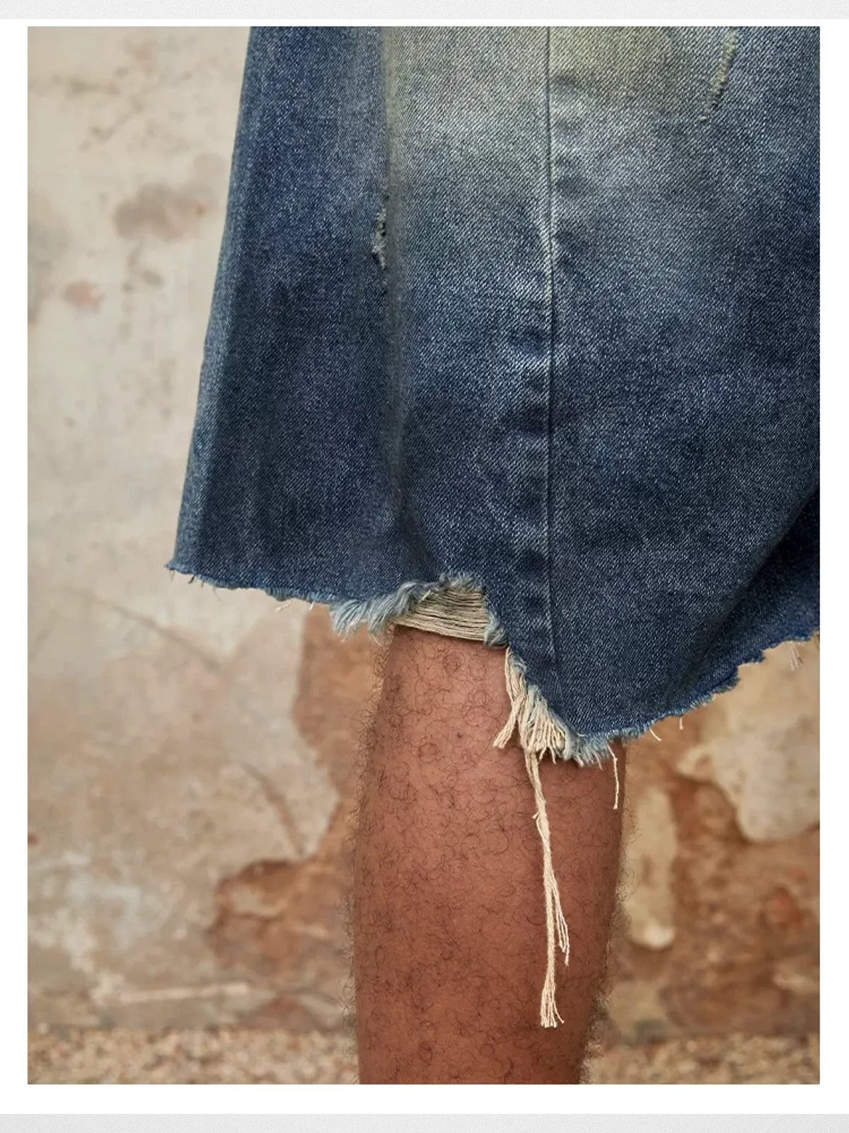 TRIANGLE PROJECT Deconstructed Distressed Denim Shorts in Blue - On Model