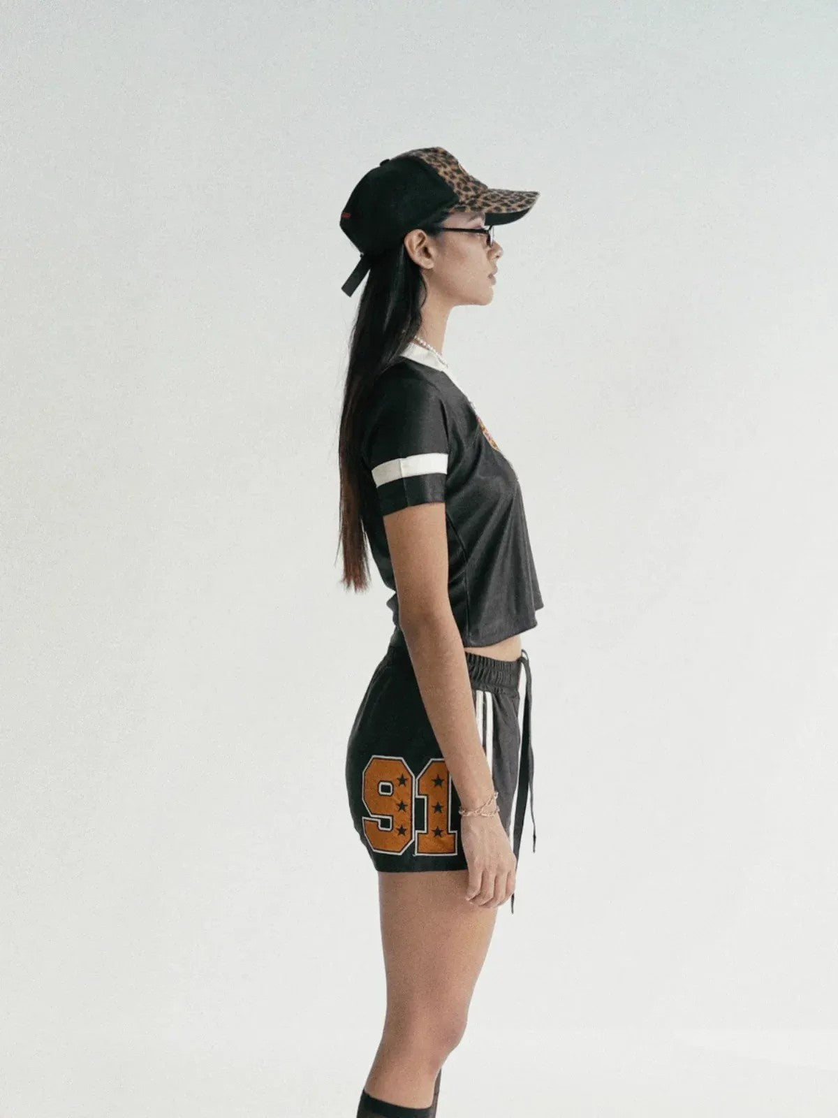 BADSEED Cropped Graphic Baseball Jersey in Black - On Model