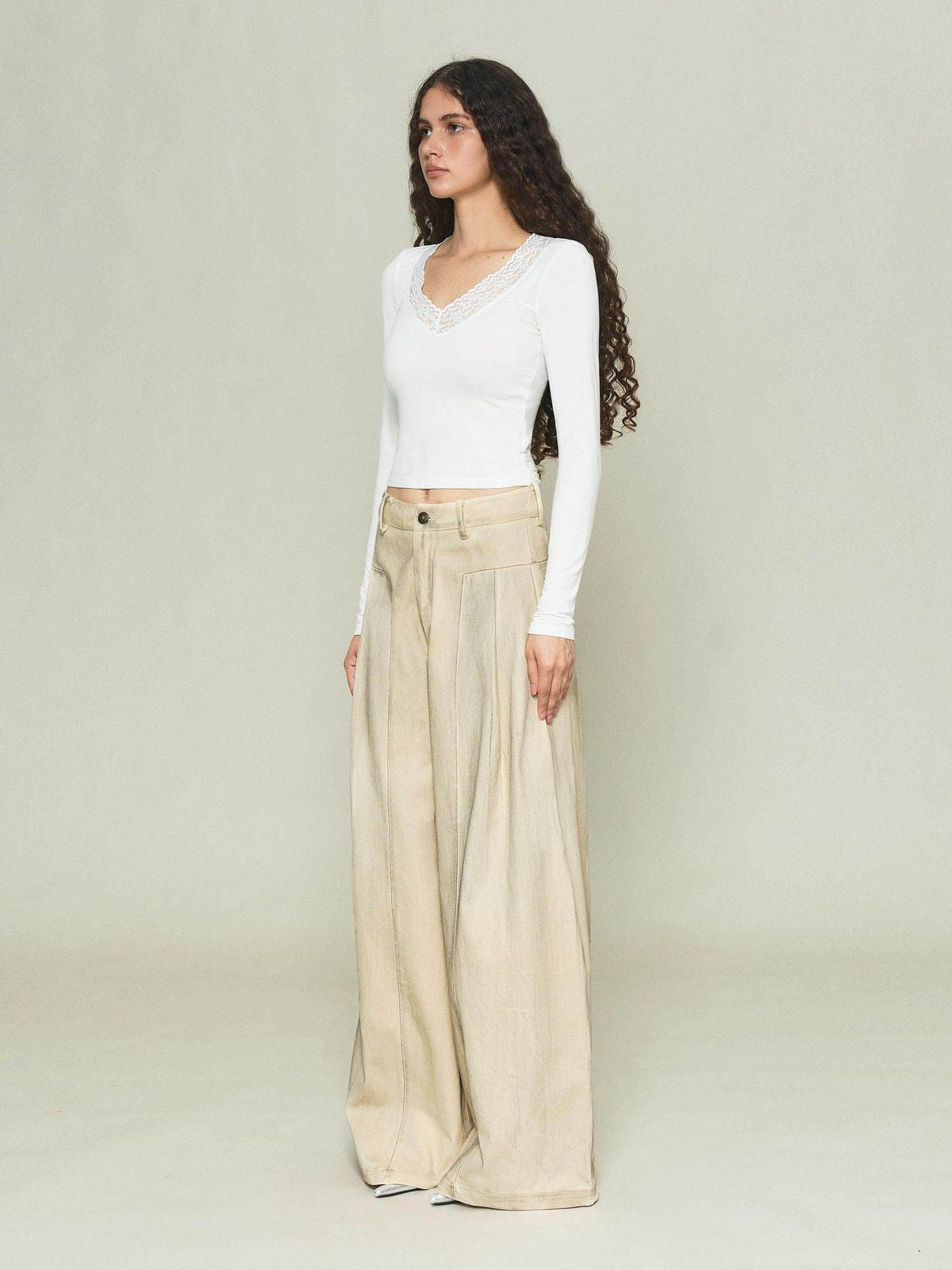 Amee Low Rise Curved Wide Leg Jeans in White - On Model