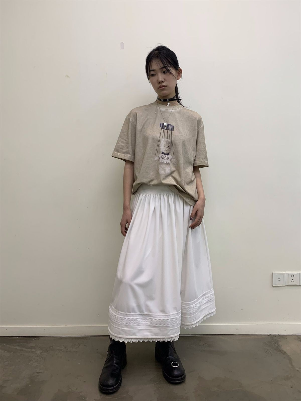 NeverSeez Garment Dyed Puppet Print Tee in Khaki - On Female Model