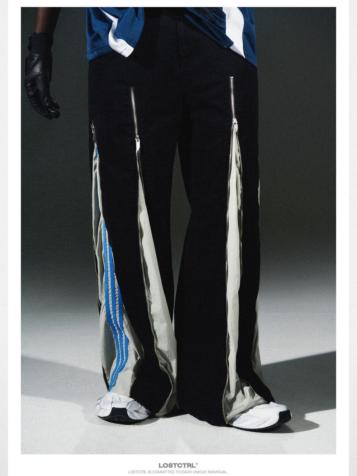 LOSTCTRL Deconstructed Zip Split Pants in Black - On Model