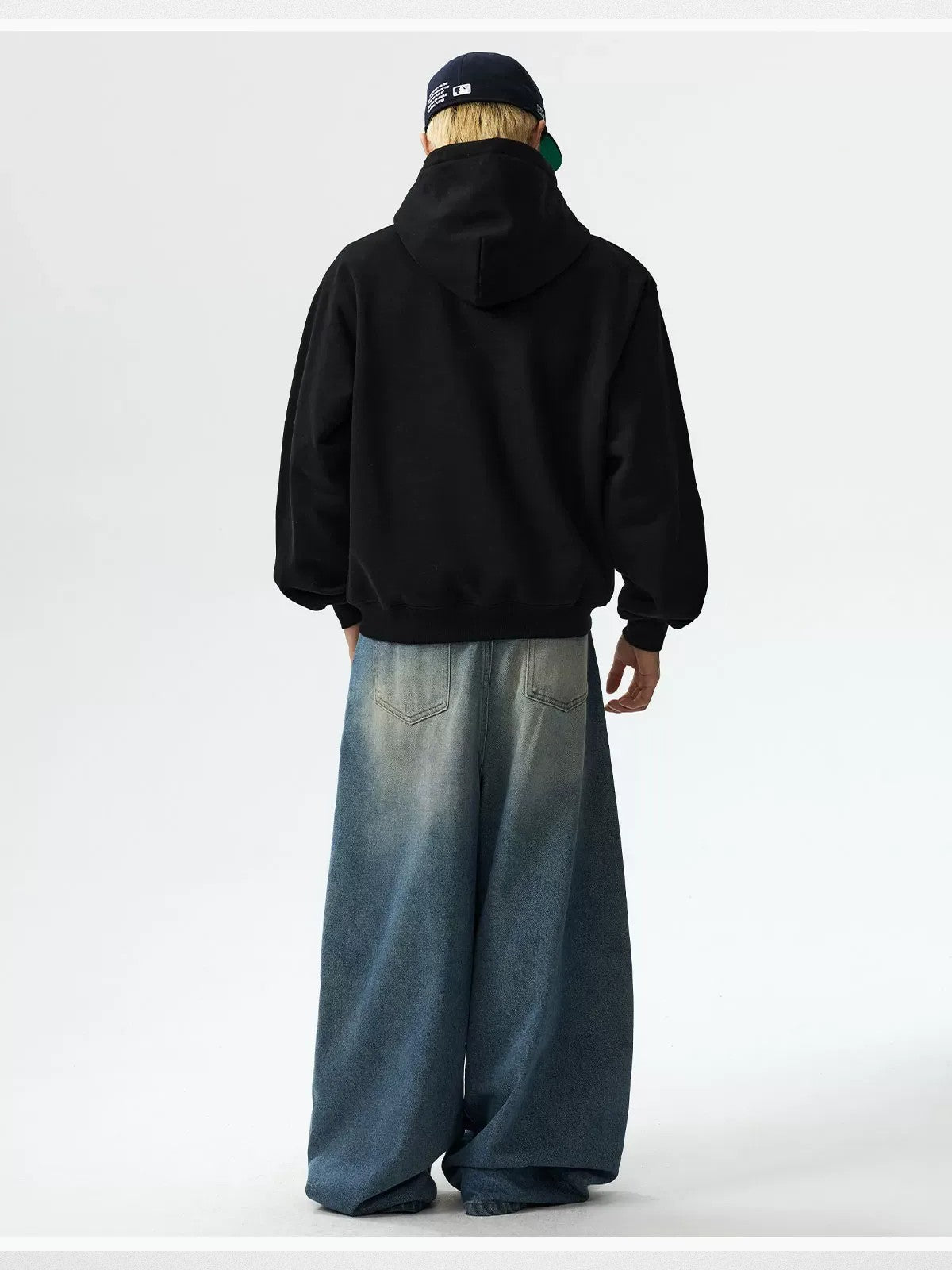 MEDM Floral Patch Fleece Hoodie in Black - On Male Model