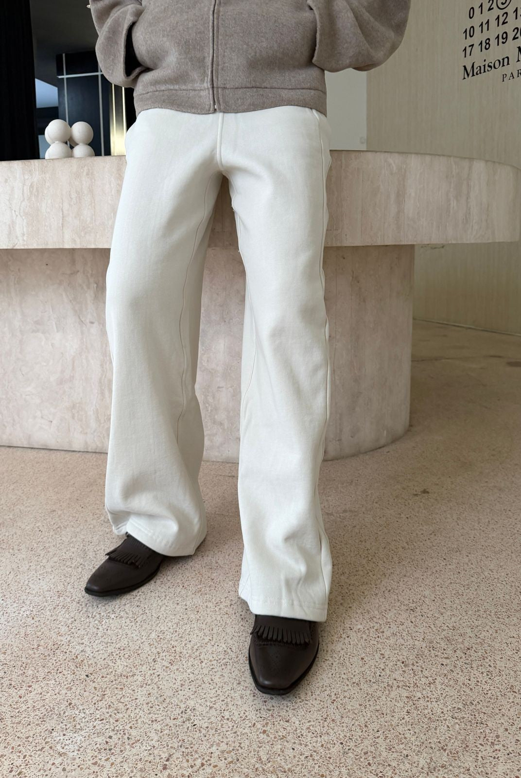 TRIANGLE PROJECT Brushed Cotton Wide Leg Sweatpants in White - On Model