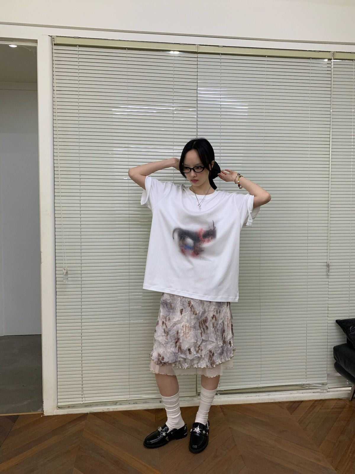 NeverSeez Hazy Puppy Print Cotton T Shirt in White - On Female Model