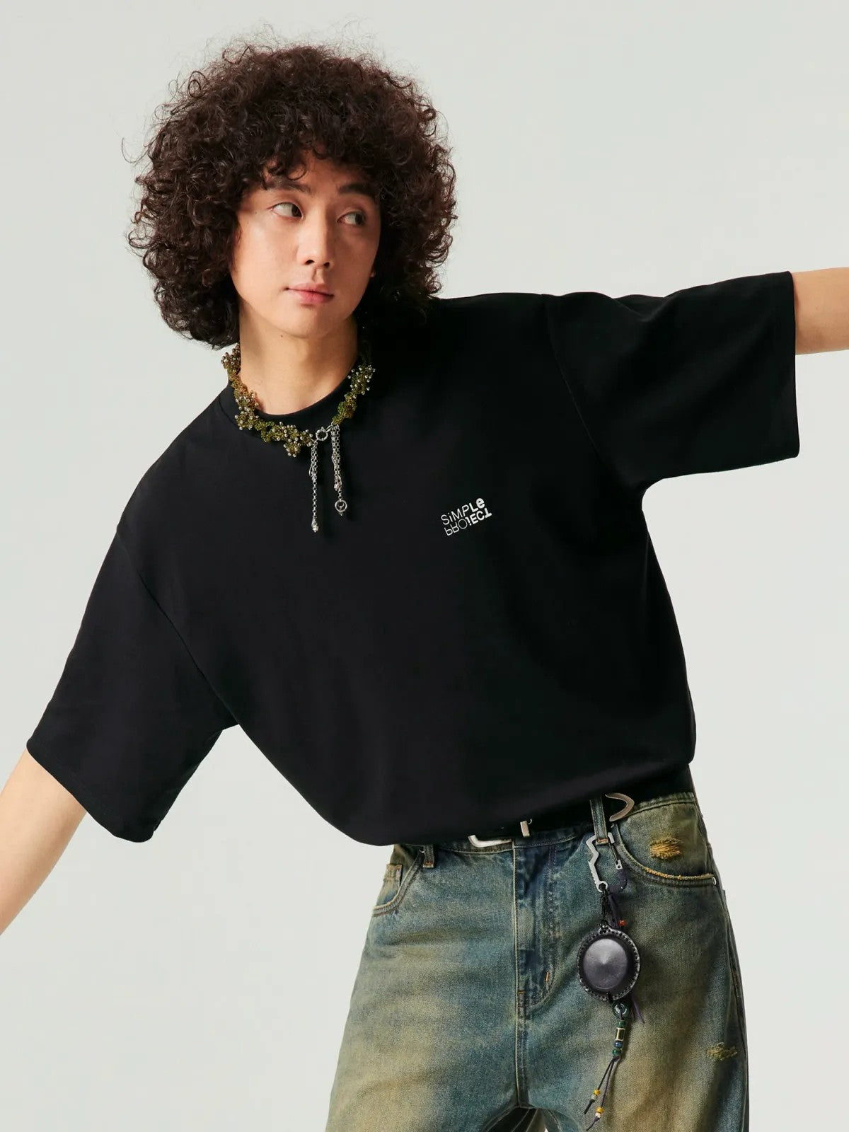 Simple Project Inverted Logo High Crew Tee in Black - On Male Model