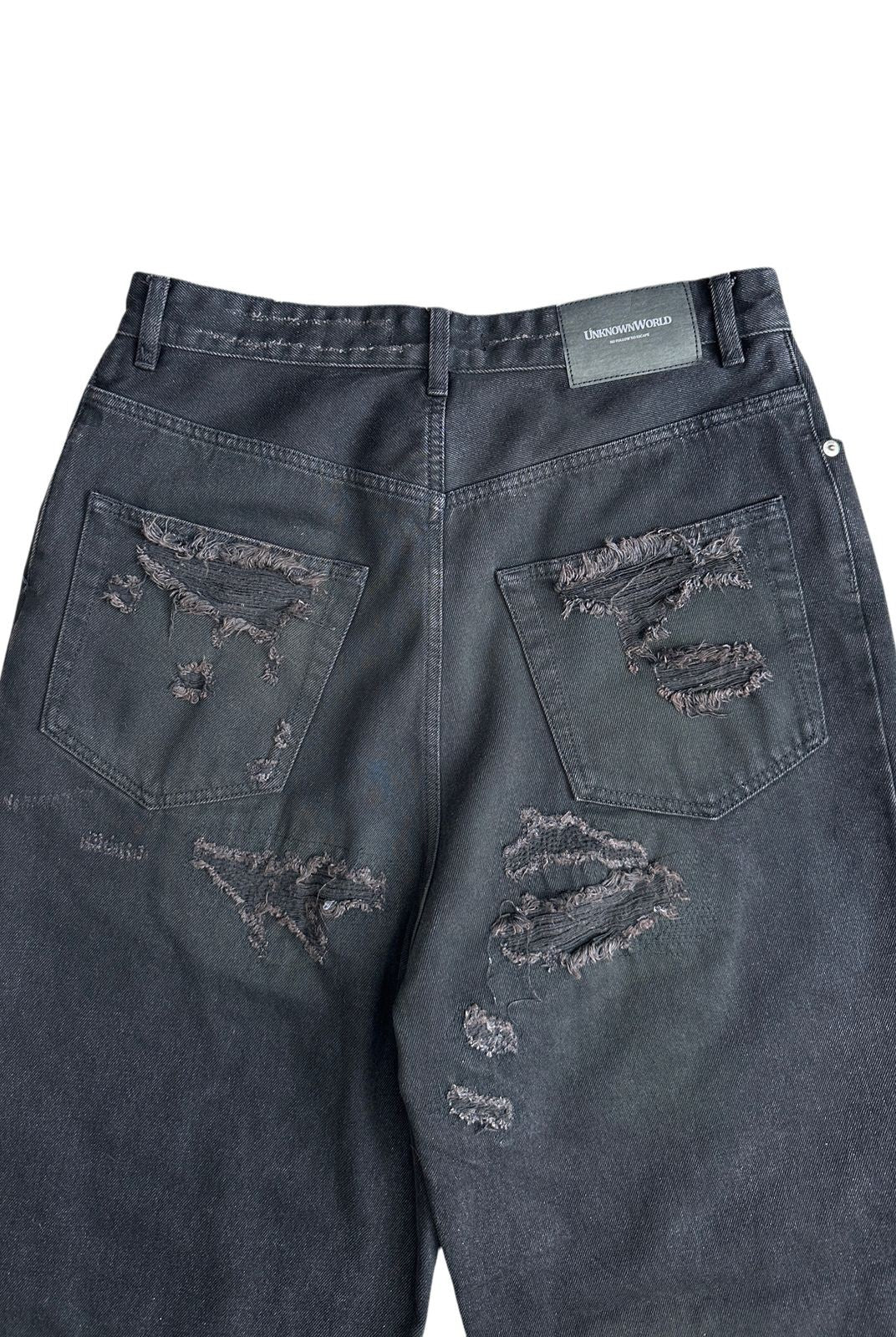 UNKNOWNWORLD Distressed Boro Mud Dyed Jeans in Black