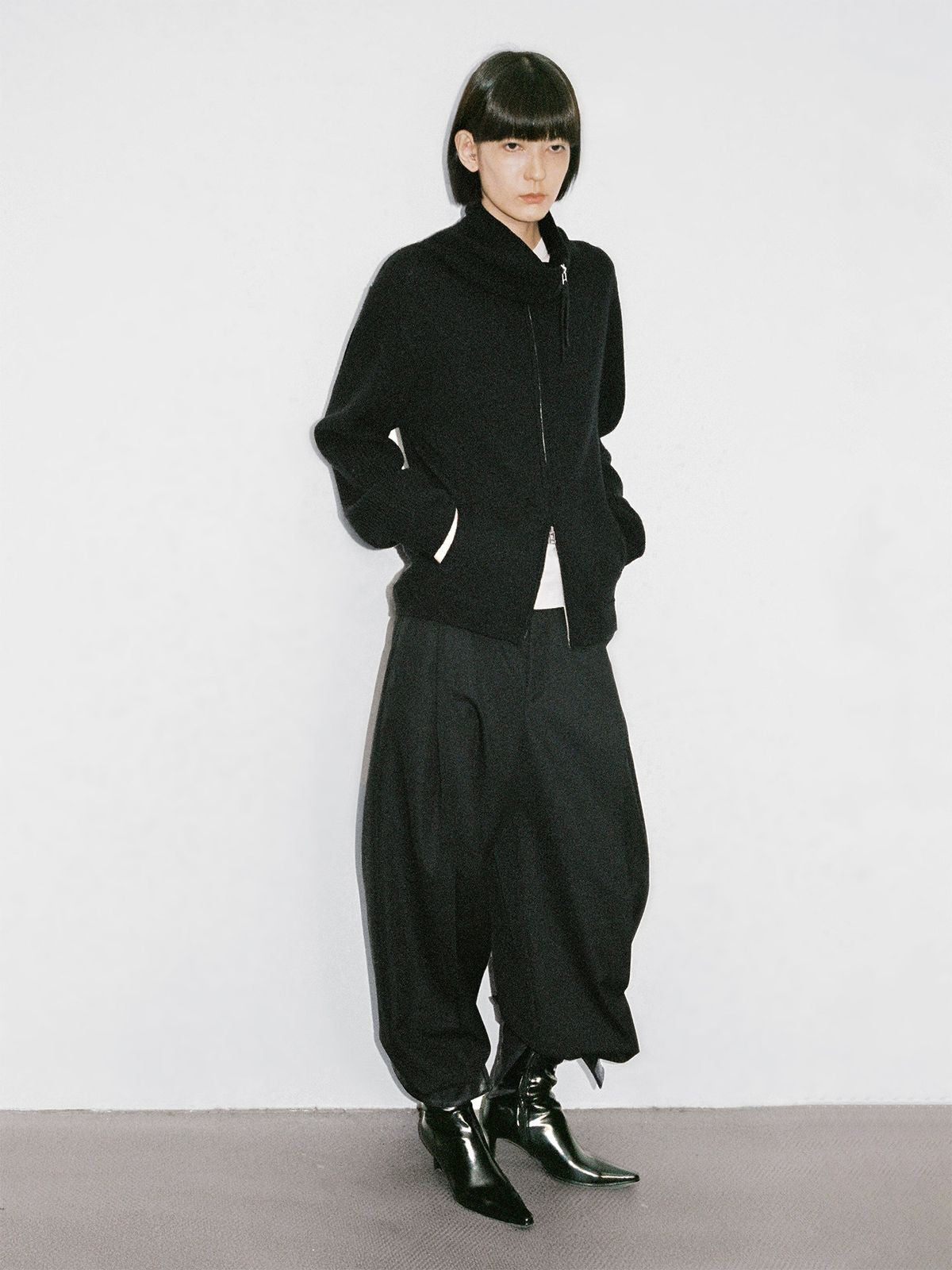 RandomPiece Merino Wool Draped Zip Cardigan in Black - On Model