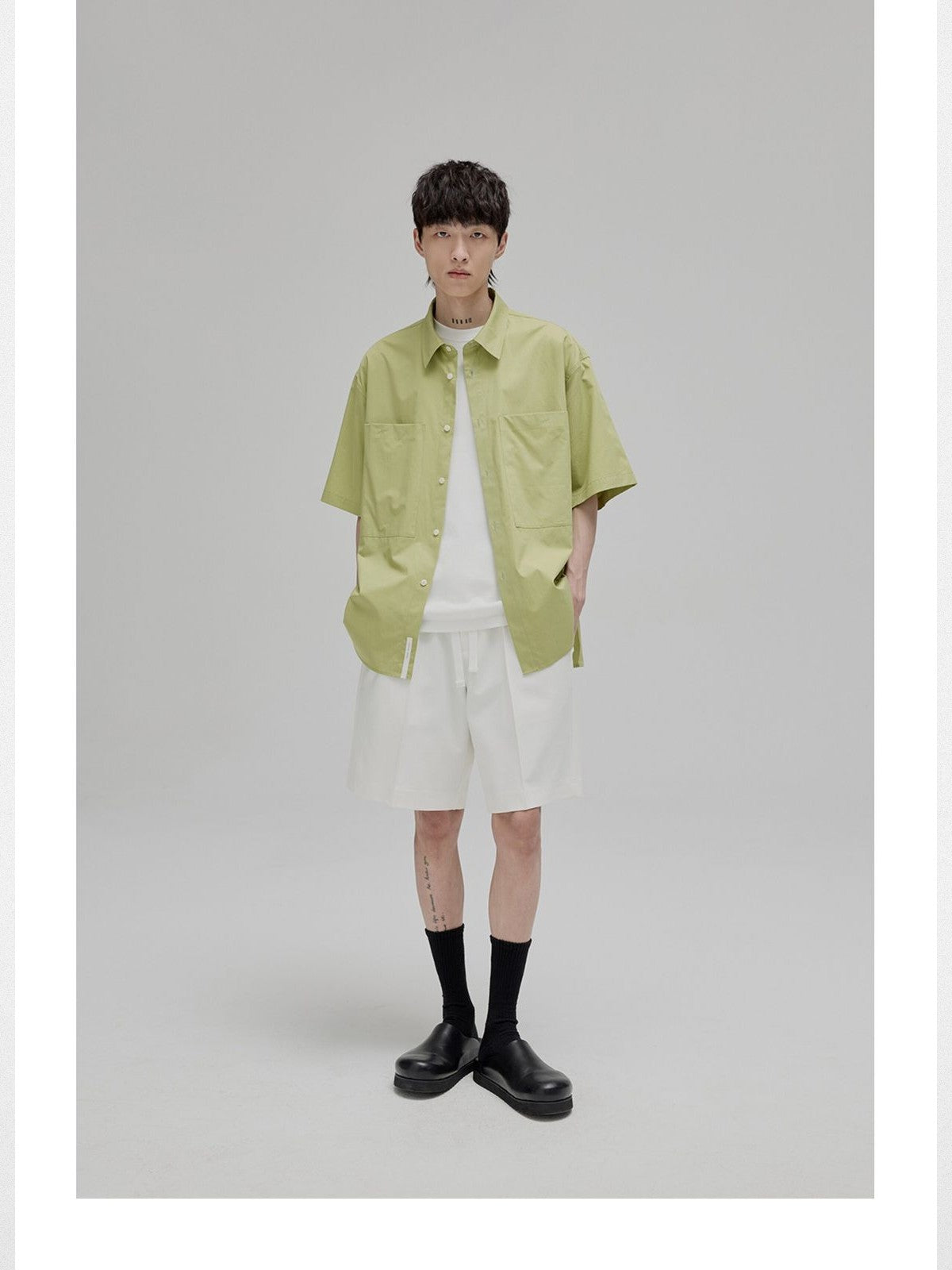 NANS Sand Washed Cotton Curved Hem Shirt in Green - On Model