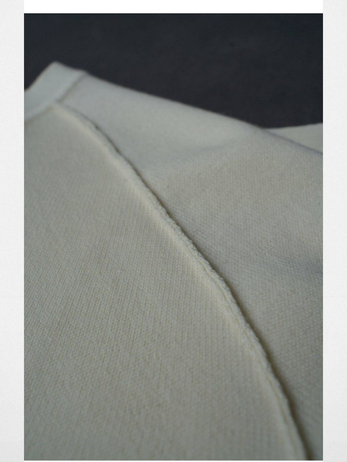 Roolrren Homme Merino Wool Raglan T Shirt in White - Detail