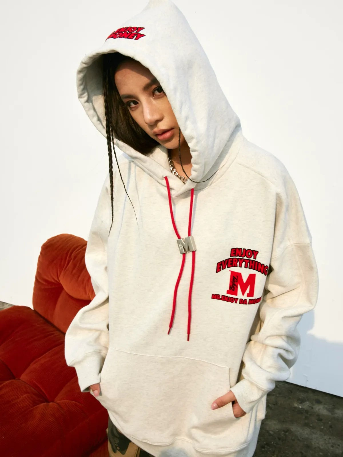 MEDM M Buckle Graphic Hoodie in Gray - On Female Model