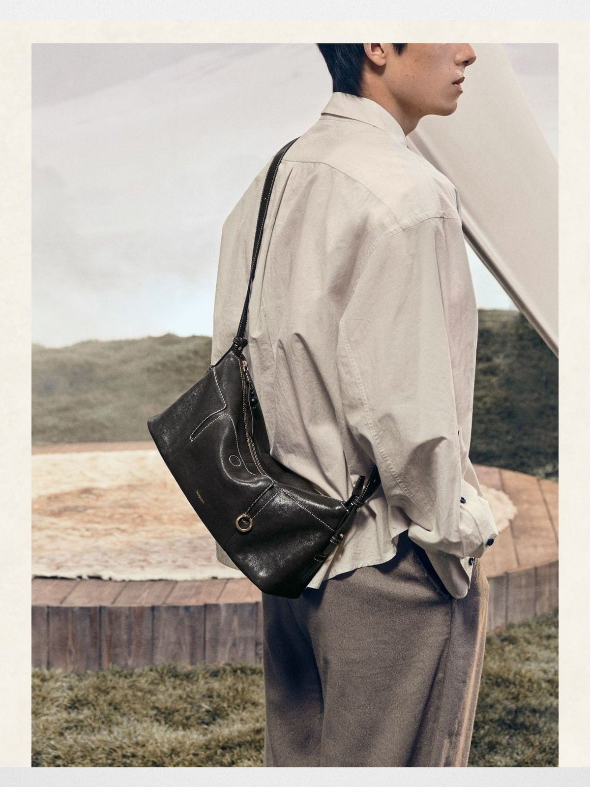 Songmont Vegetable Tanned Leather Hobo in Black - On Model