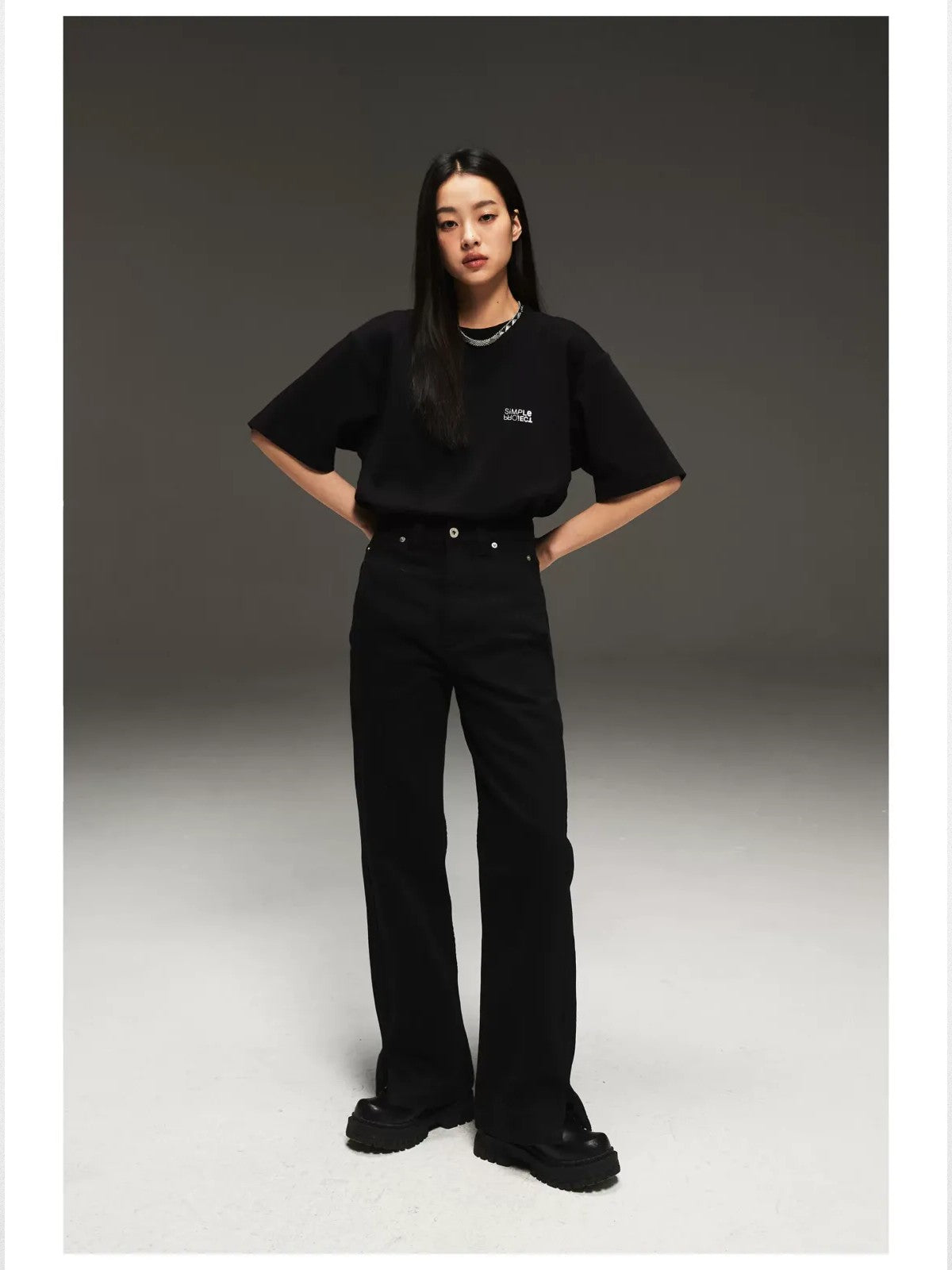 Simple Project Inverted Logo High Crew Tee in Black - On Female Model