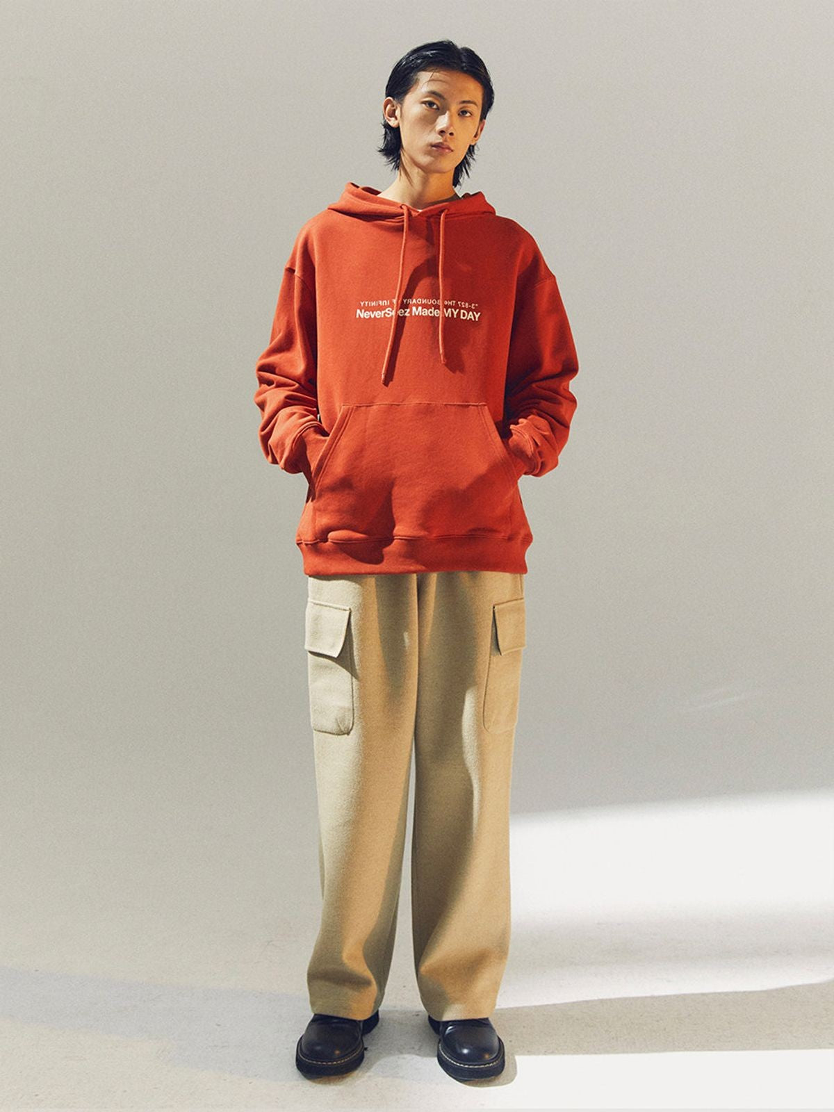 NeverSeez Anniversary Logo Print Hoodie in Orange - On Model