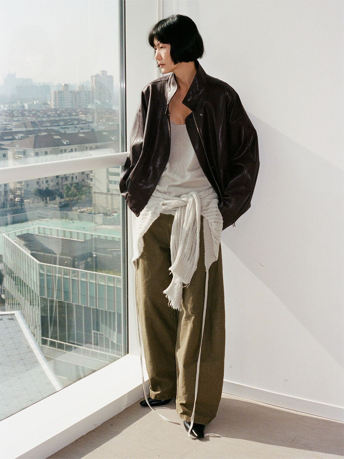 RandomPiece Elastic Hem Faux Leather Jacket in Brown - On Model