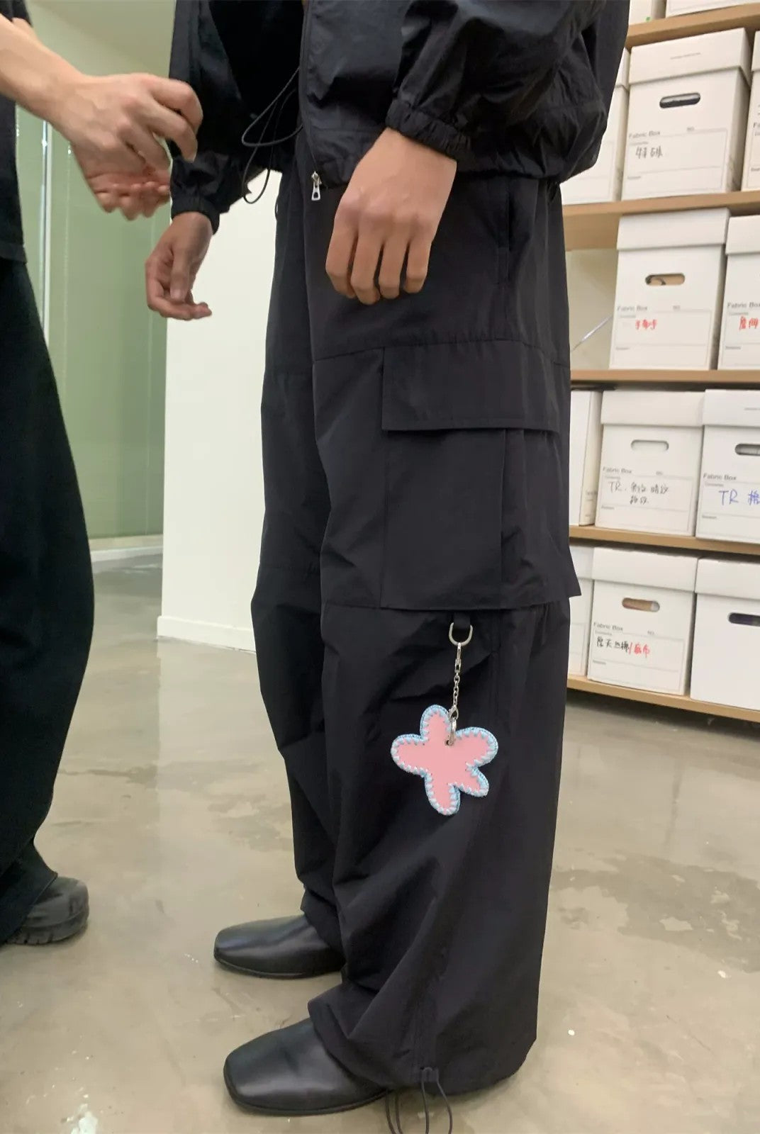 NeverSeez Accordion Pocket Wide Leg Cargo Pants in Black - On Model