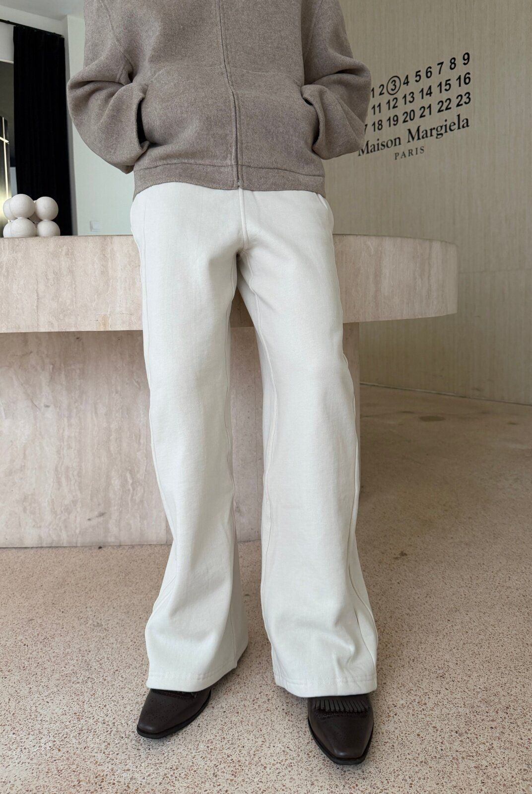 TRIANGLE PROJECT Brushed Cotton Wide Leg Sweatpants in White - On Model