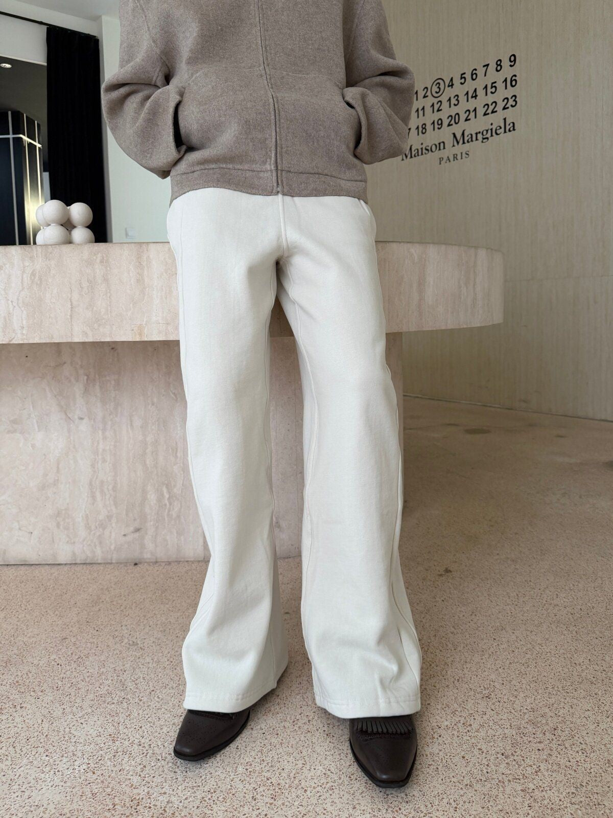 TRIANGLE PROJECT Brushed Cotton Wide Leg Sweatpants in White - On Female Model